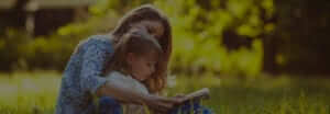 mother reading to child daughter